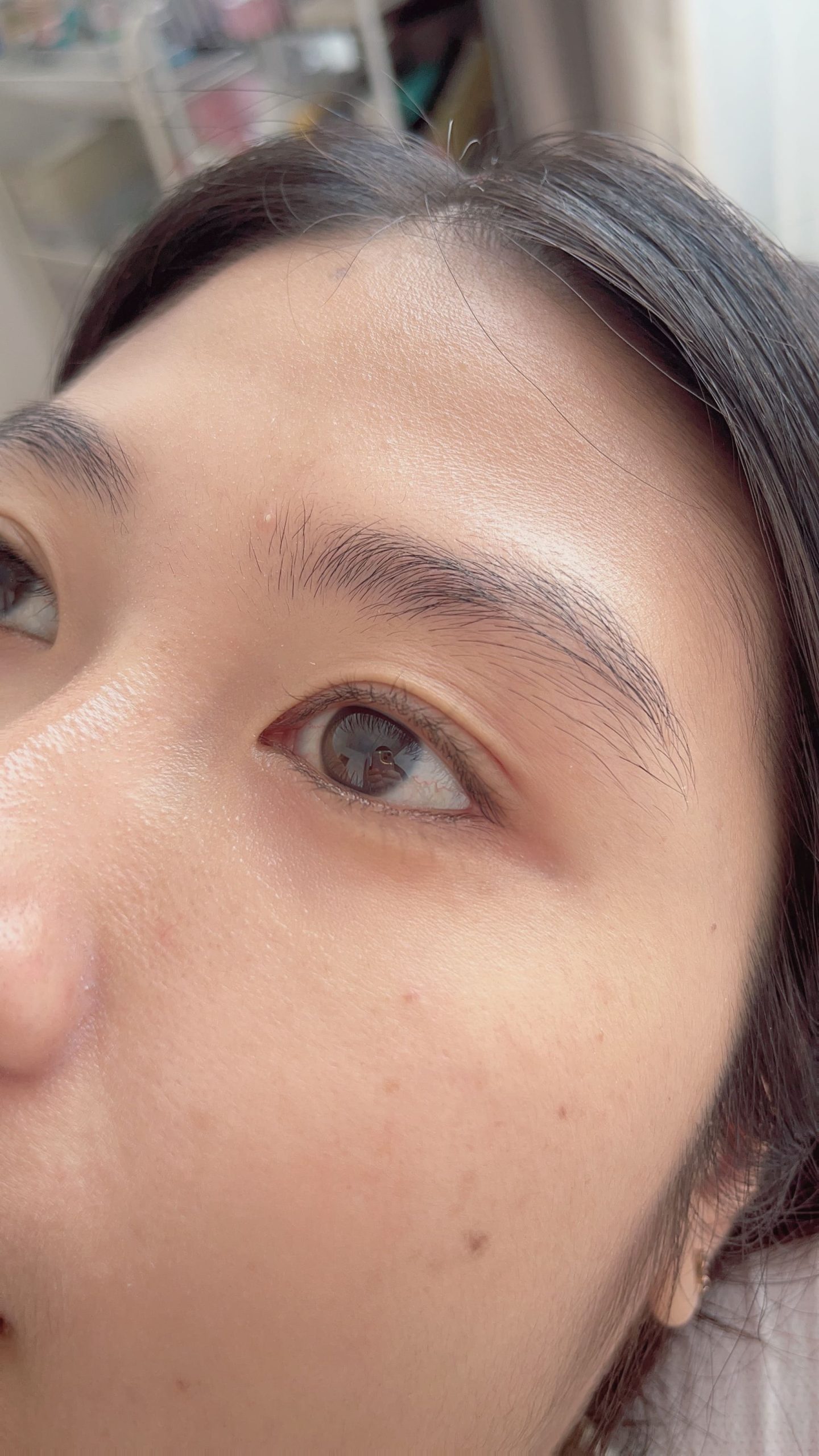 Edgy rainbow hairstyle with glitter makeup